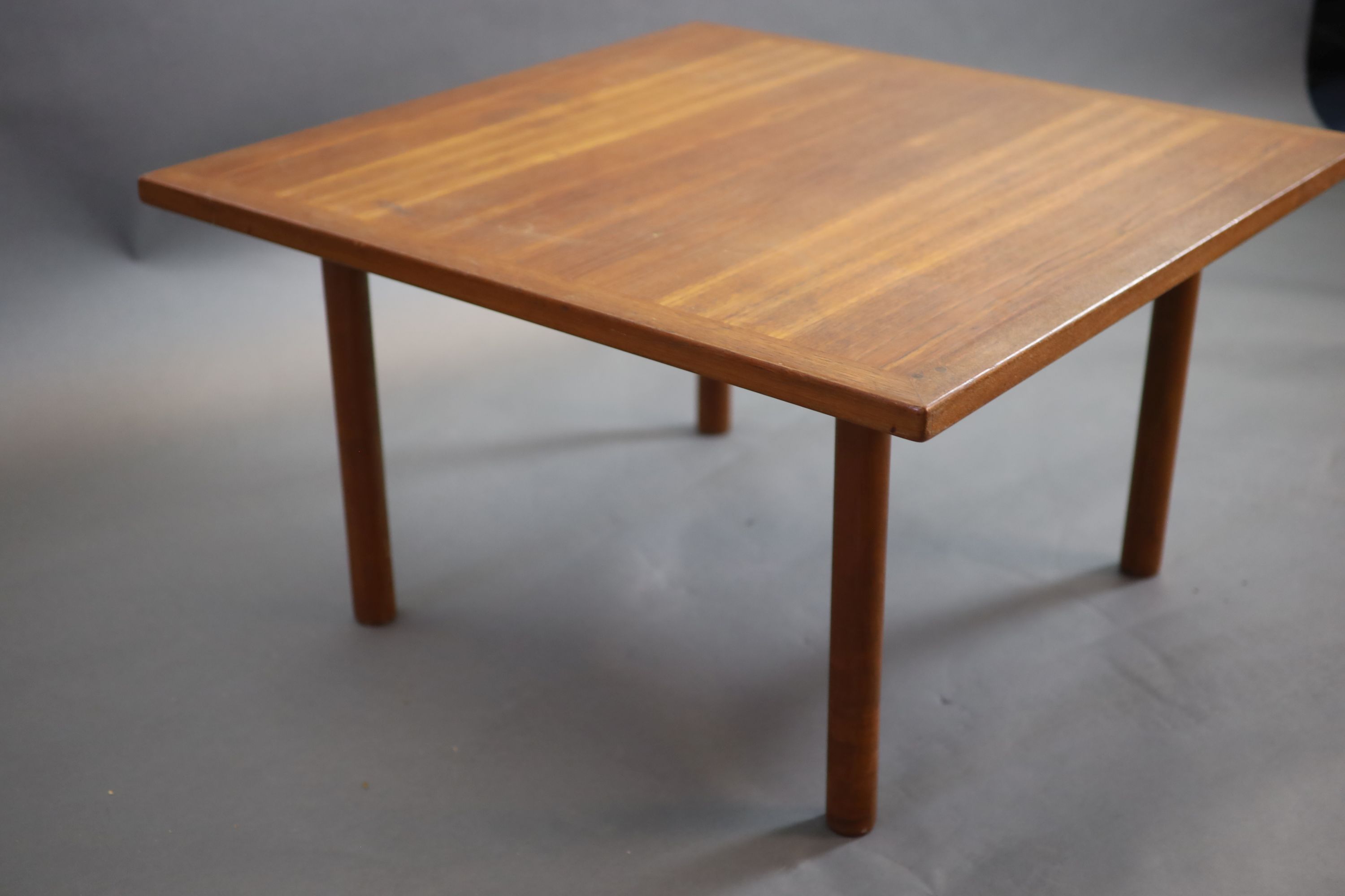 Hans Wegner for Andreas Tuck, a Danish teak coffee table, 85 x 85cm, 50cm high.